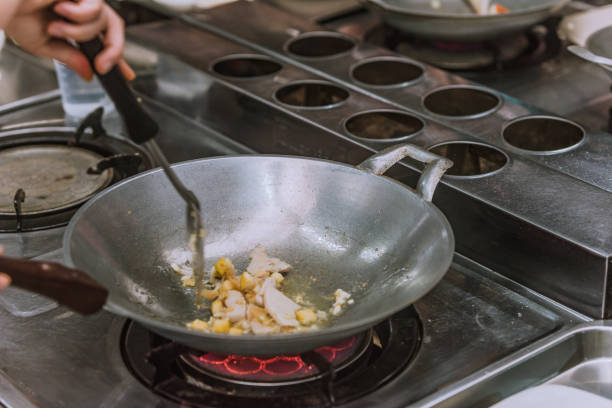 istock cooking thai food in a cooking class 1063731714