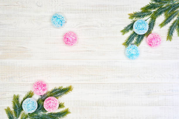 istock Festive composition of Christmas decorations on white wooden background. 1063732042