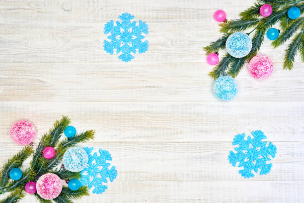istock Festive composition of Christmas decorations on white wooden background. 1063734434