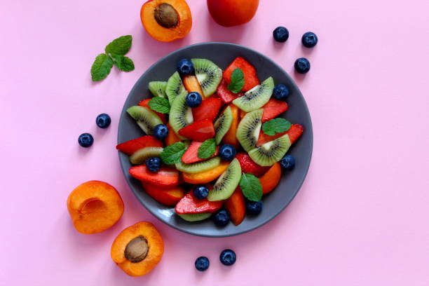 Plate with healthy fruits salad. stock photo