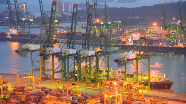 istock Logistics and transportation of Container Cargo ship and Cargo working crane bridge in shipyard 1063746146