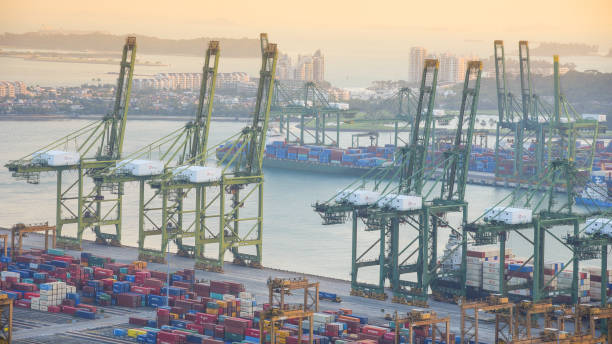 istock Logistics and transportation of Container Cargo ship and Cargo working crane bridge in shipyard 1063746152