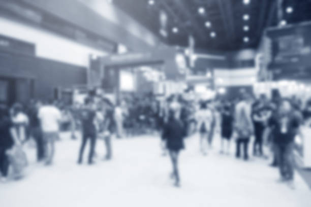 istock Abstract blurred event exhibition with people background, business convention show concept 1063749030