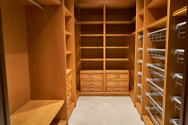 istock Luxury wardrobes in the dressing room in modern style 1063749094