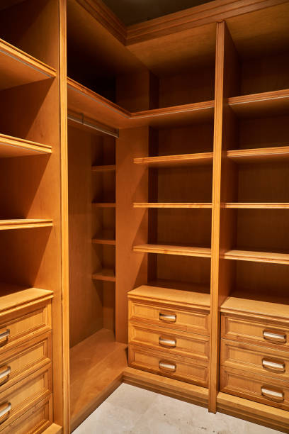 istock Luxury wardrobes in the dressing room in modern style 1063749154