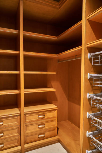 istock Luxury wardrobes in the dressing room in modern style 1063749194