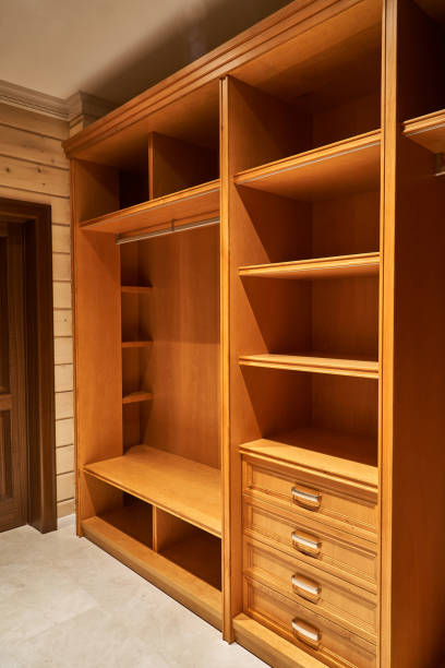 istock Luxury wardrobes in the dressing room in modern style 1063749214