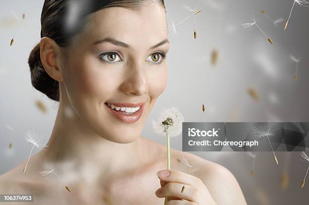 Dandelion In Hand Stock Photo - Download Image Now - Adult, Adults Only, Beautiful People