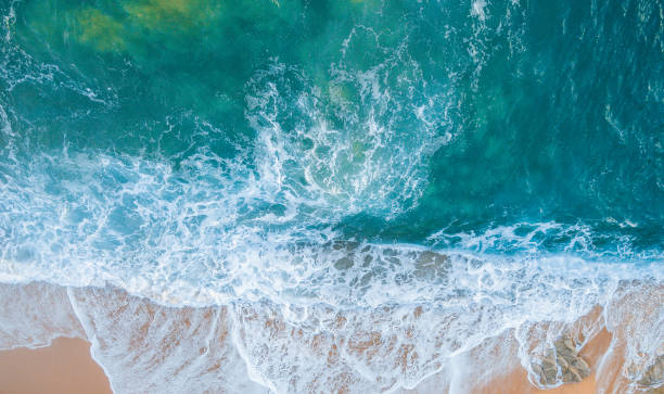 istock Beach full of rocks and waves in Spain 1063750512