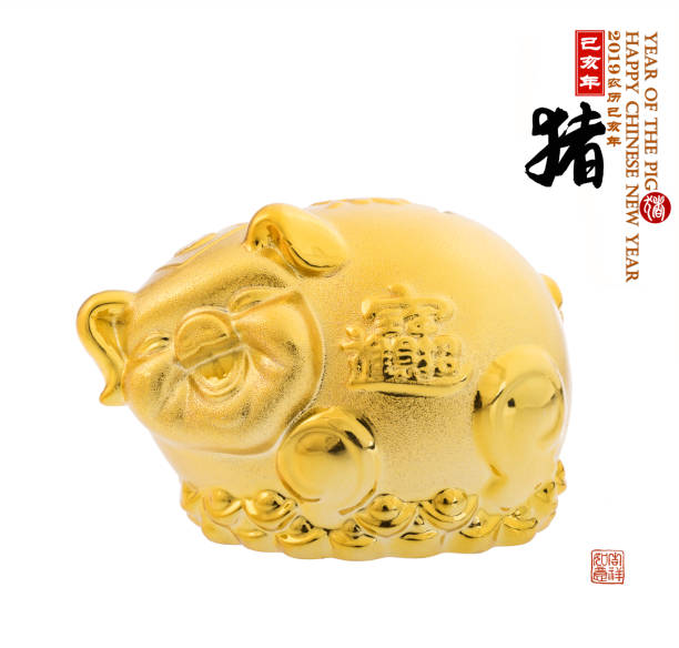 istock Golden pig statue isolated on white. 1063750666