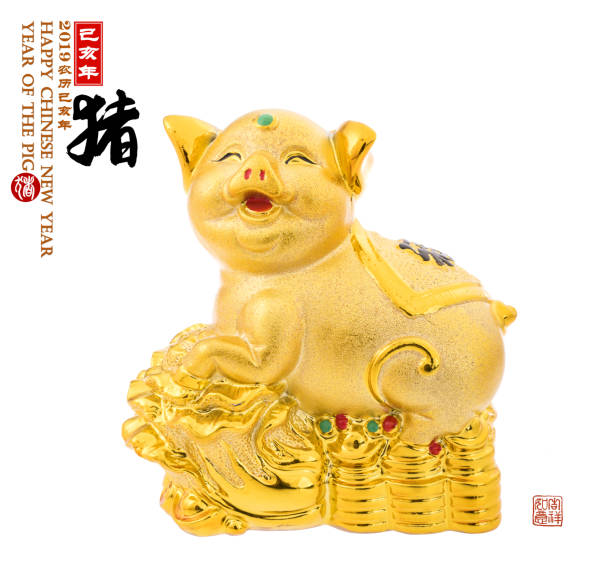 istock Golden pig statue isolated on white. 1063750668