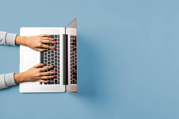 istock Overhead shot of office desktop 1063755824
