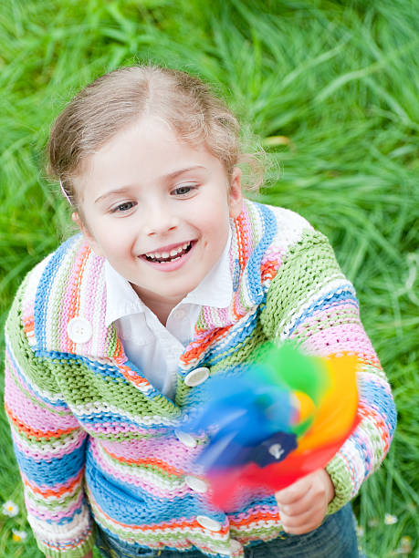 istock Girl with pinweel 106376024