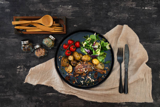 istock Roasted Duck Legs and Potatoes 1063764346