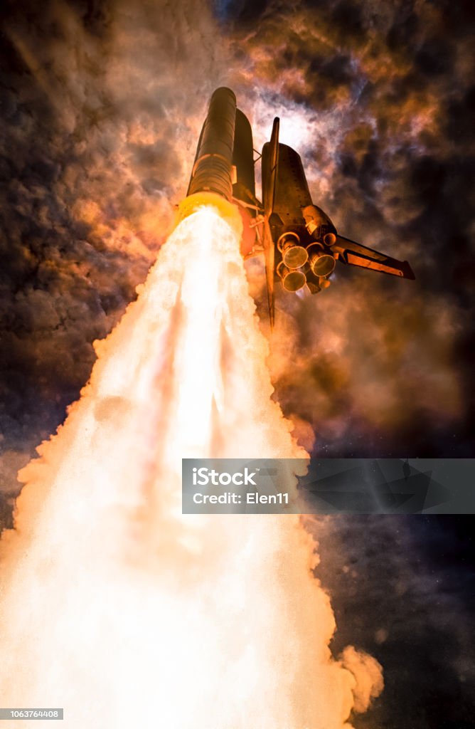 Spaceship launch at night, low-angle perspective. The elements of this image furnished by NASA. Rocketship Stock Photo