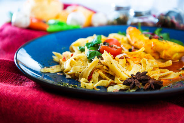 istock Tagliatelle with chicken, mushrooms, cream and chives 1063764726