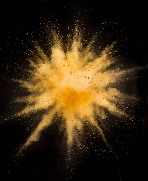 istock Gold powder explosion on black background. 1063767818