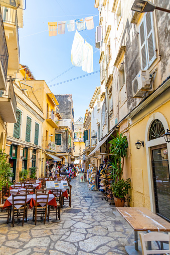 Corfu, Greece - October 16, 2018: View of typical narrow street of an old town of Corfu in Greece