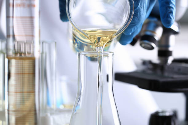 istock Yellow liquid spilled petrol additive innovative supply 1063777320