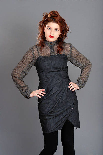 istock young red head wearing jean dress 106377736