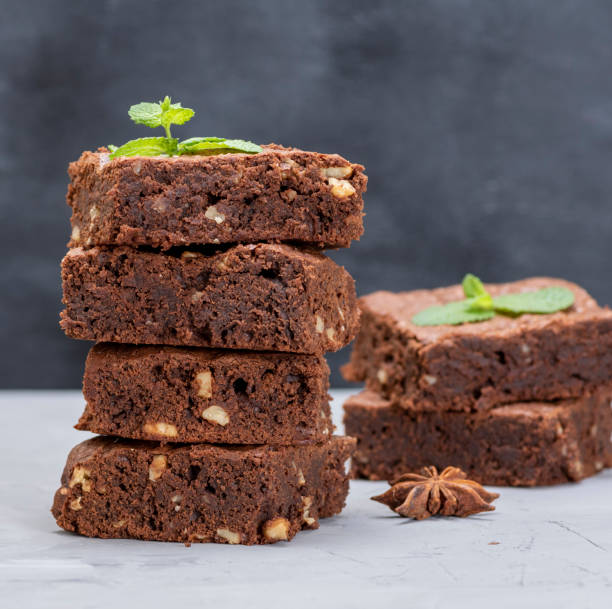 istock stack of square pieces of chocolate brownie cake 1063779382