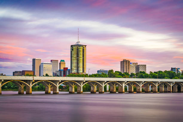 Tulsa, Oklahoma, USA Tulsa, Oklahoma, USA downtown skyline on the Arkansas River at dusk. tulsa landmark stock pictures, royalty-free photos & images
