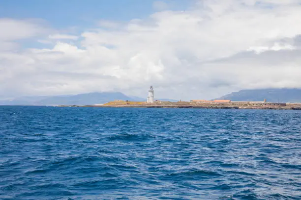 Photo of lighthouse of Tarifa town from Atlantic Ocean