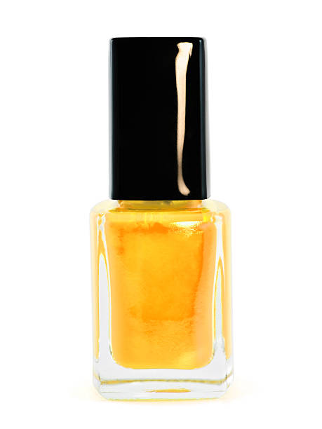 istock Yellow nail polish on white background 106378298
