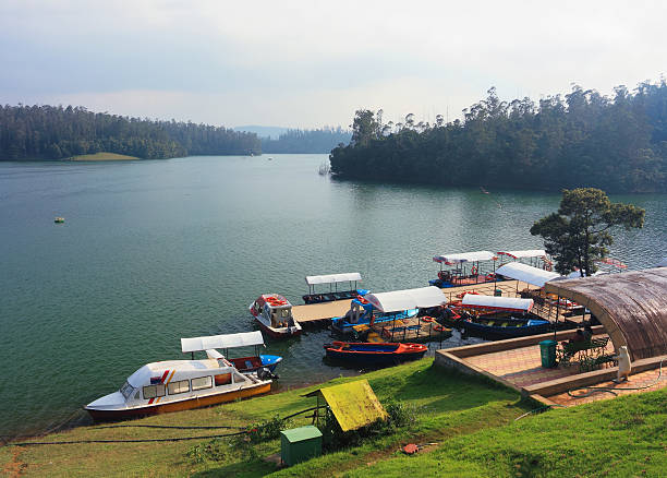 Boats docked at Pykara Lake  tamil nadu landscape stock pictures, royalty-free photos & images