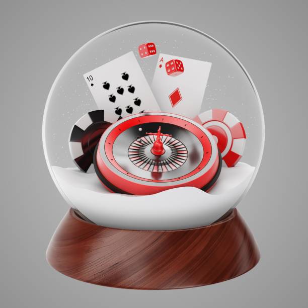 istock Christmas snow globe with roulette, cards and poker chips inside, 3D rendering 1063785186