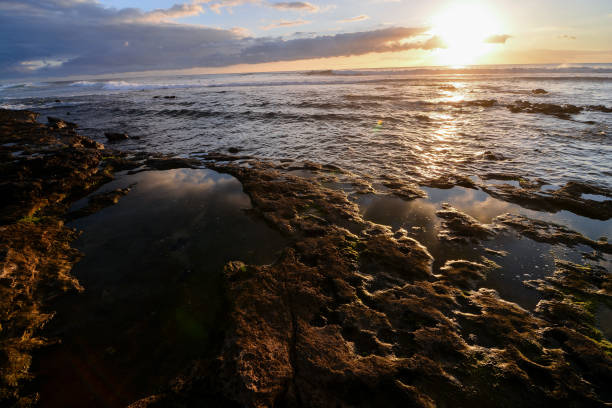 istock The Sun Setting in the Sea 1063785594