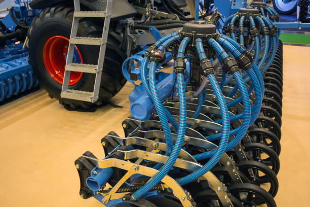 istock working bodies of the grain drill for cutting the sowing bed, uniform seeding and rolling 1063787348