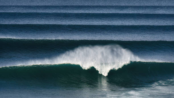 big waves crashing stock photo