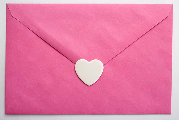 Pink envelope and heart Pink envelope and heart on white background. pink envelope stock pictures, royalty-free photos & images