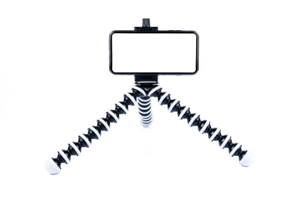 istock Smartphone or mobile is placed on a octopus tripod. To prepare for shooting picture or video. on white background or isolated 1063793292