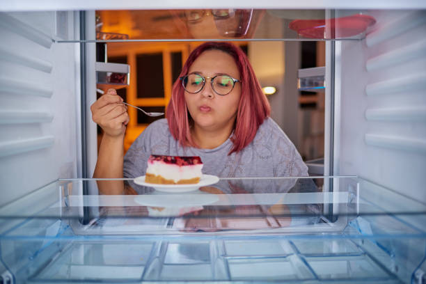 istock Woman eating gateau. 1063793448
