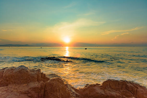 istock dawn on the sea 1063793578