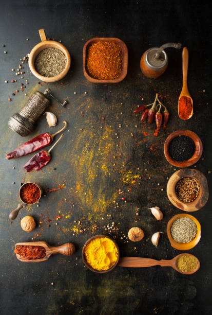 istock Spices, herbs and  condiments on a table in a spoon 1063793818