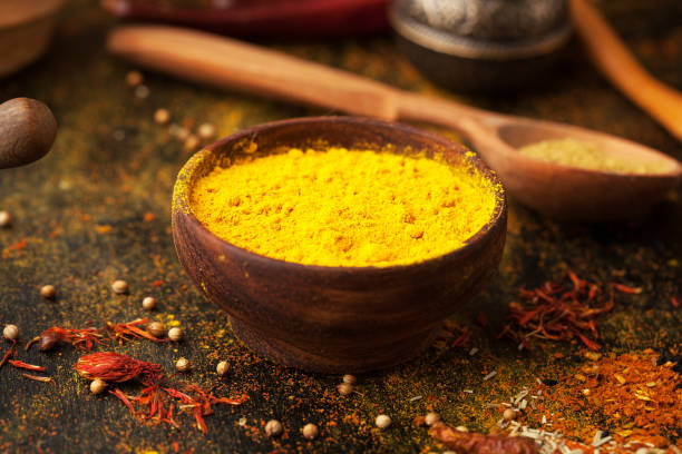 istock Turmeric powder, spices, and condiments 1063794822