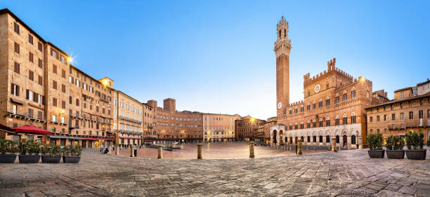Panorama of Siena, Italy Panorama of Siena, Italy. Piazza del Campo square with gothic town hall building and tower siena italy stock pictures, royalty-free photos & images