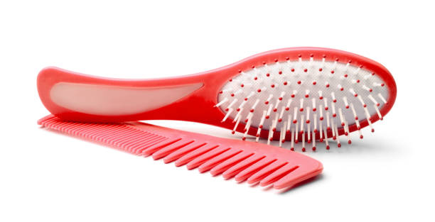 Comb and hairbrush isolated on white