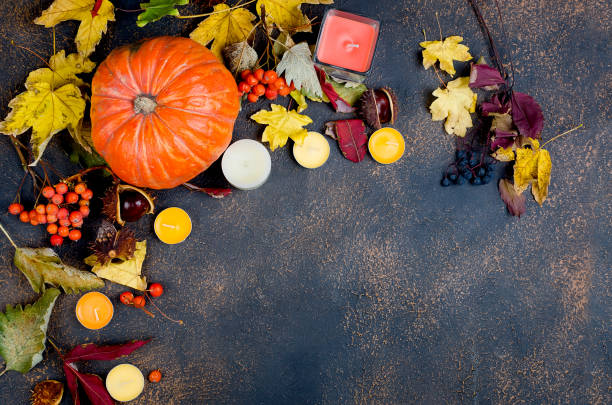 istock Halloween background with gingerbread, pumpkins and candles 1063806646