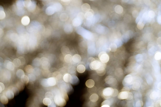 istock White sparkling Christmas lights. Blurred abstract background 1063807654