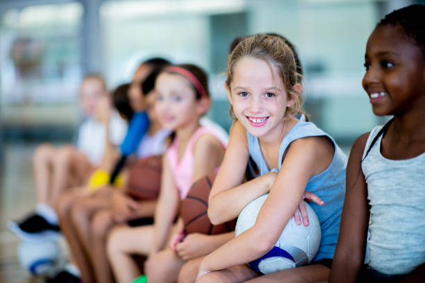 istock Playing sports in gym class 1063820266