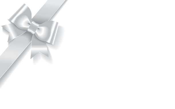 istock Single decorative silver satin bow with diagonally ribbon on the corner isolated on white background 1063820368