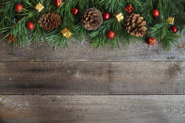 istock Christmas card on wooden background 1063821734