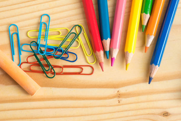 istock School stationary. Studio shot on wooden background 1063824144