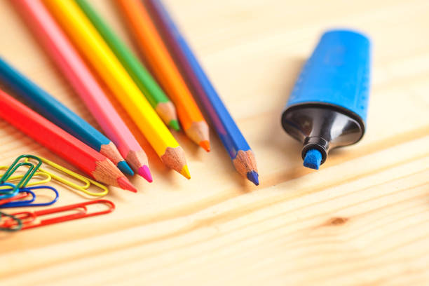 istock color pencils and marker on wooden table 1063824156
