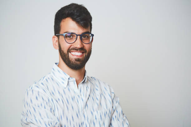 istock Millenial headshot looking at camera. 1063825362
