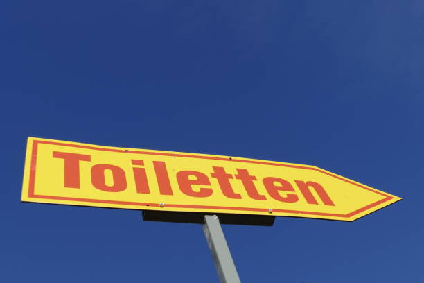 istock Toilet sign, signpost, arrow 1063826208